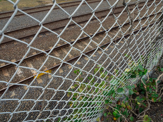 Chainlink fence along a railway siding in Melbourne, Australia