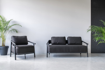 Stylish interior with gray and black walls
