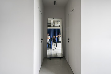 Fototapeta na wymiar Stylish interior in loft style with gray walls
