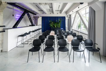 Stylish interior in loft style with gray walls