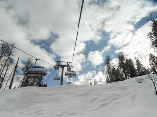 Fototapeta na wymiar Winter sport - skiing and snowboardering in mountains.