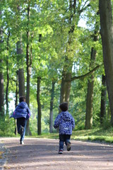 Children run through the Park