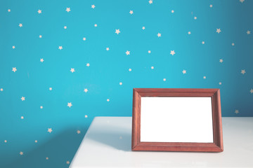 blank photo frame in nursery