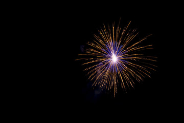 Fototapeta premium fireworks at night at the sea