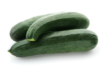 Fresh zucchinis on white background