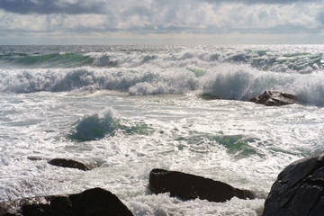Ocean daytime landscape, giving strength. The space is filled with water, spray and ocean noise