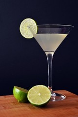 daiquiri cocktail on wooden chopping board