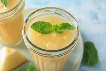 Glass jar with delicious melon smoothie, closeup