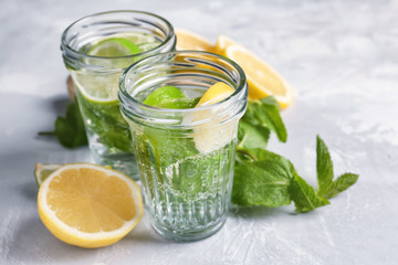 Jars of fresh mojito on light table