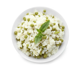 Bowl with tasty boiled rice and peas on white background