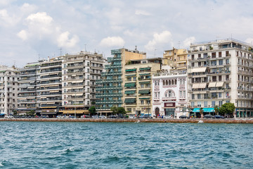 Thessaloniki, Greece - August 16, 2018: View of Thessaloniki from the sea. Buildings, hotels and restaurants in Nikis Avenue. Nikis Avenue is the central waterfront avenue in Thessaloniki, Greece.