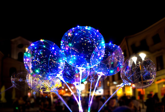 LUBLIN, POLAND - JULY 27, 2018: LED transparent balloon with multi-colored luminous garland.