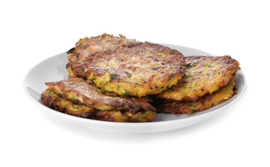 Plate with tasty zucchini pancakes on white background