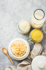 Healthy breakfast rice and millet porridge in a pot. Top view, space for text.