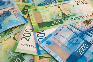 Fototapeta na wymiar Russian new paper currency lying in chaotic order
