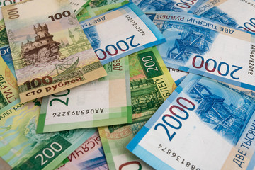 Obraz premium Russian new paper currency lying in chaotic order