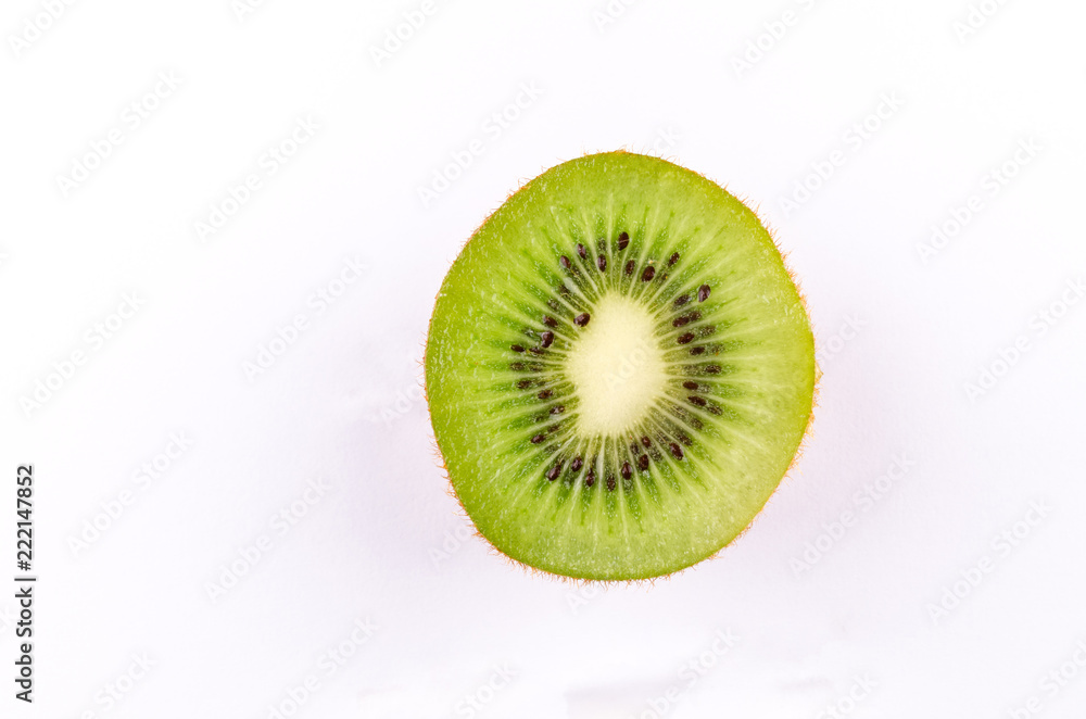 Wall mural Sliced kiwi isolated