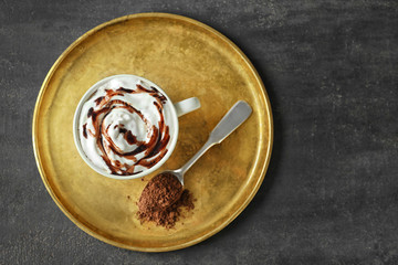 Cup of delicious cocoa on tray