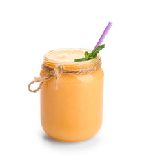 Jar of fresh melon smoothie on white background