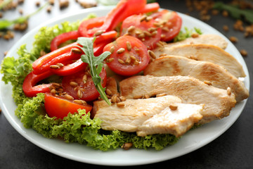 Tasty chicken salad on plate
