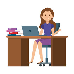 young woman at desk with laptop and books