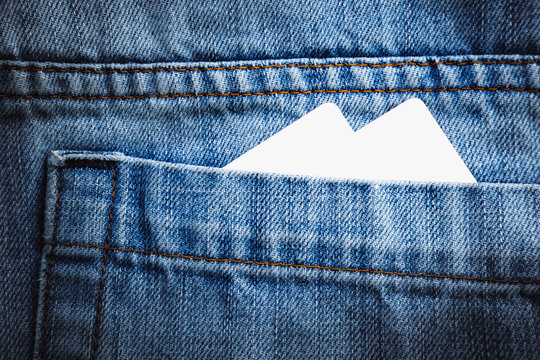blank card in blue jeans` pocket