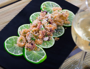 Battered calamari and cuttle with lime