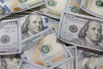 Background of one hundred dollar bills