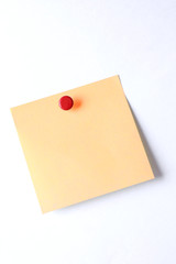 blank postit sticky note with push pin isolated on white background