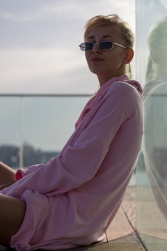 young russian woman with sunglasses urban style modern lifestyle