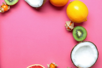 Flat lay composition with various delicious fruits on color background