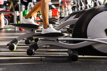 Cropped image of amazing sports woman doing fitness exercise