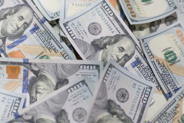Background of one hundred dollar bills