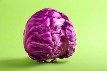 Fresh red cabbage on color background