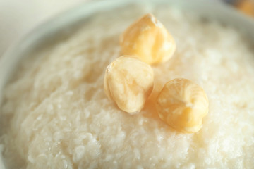 Delicious rice pudding with hazelnuts, closeup