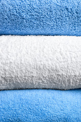 Stack of clean soft towels, closeup