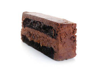 Piece of delicious chocolate cake on white background