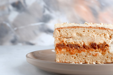 Piece of delicious cake on plate, closeup