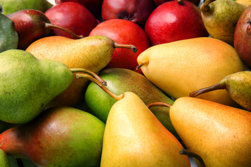 Delicious ripe various pears, closeup