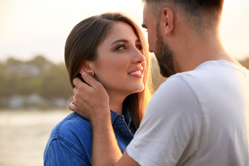 Portrait of happy loving couple outdoors
