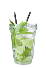 Jar of fresh lime lemonade on white background