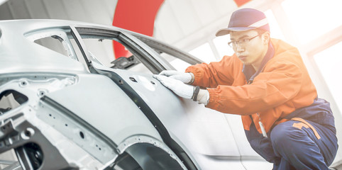 Automotive engineers are checking body grinding accuracy