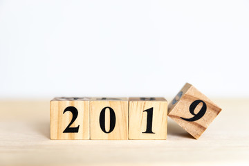 2019 new year concept design with wooden cube  on floor and white background