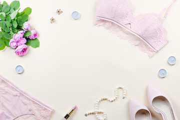 Fototapeta na wymiar Woman elegant pink lace bra and panties, pumps and jewelry. Stylish lingerie flat lay.