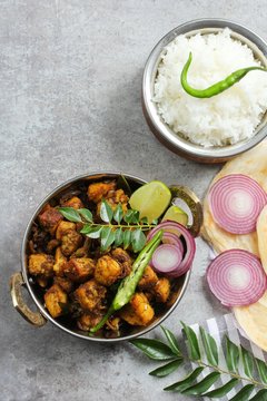 Kerala Pork Fry or Roast served with Parotta and rice,Top down view