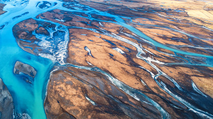 Aerial view and top view river in Iceland. Beautiful natural backdrop. - obrazy, fototapety, plakaty