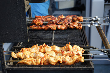 The meat is cooked grilled. Barbecue on the coals.