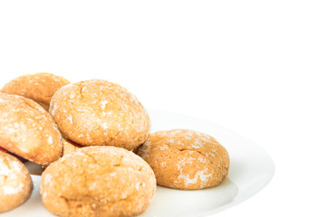 Sweet cookies on white plate isolated on white background