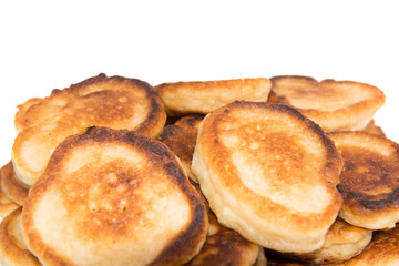 Heap of sweet toasted pancakes isolated on white background