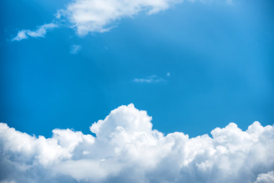 Fototapeta Beautiful pure white clouds on bright blue sky